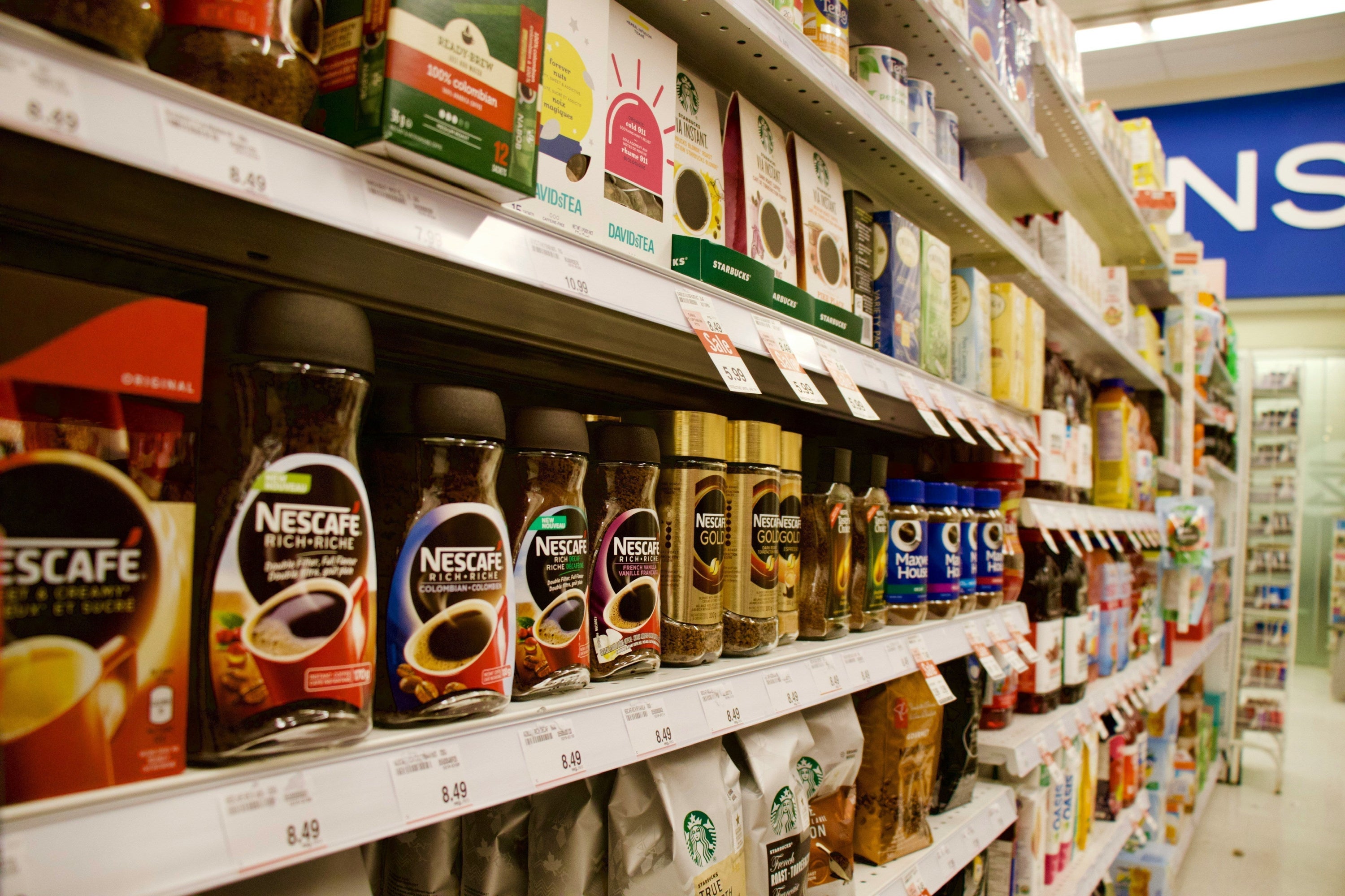 supermarket shelf with instant coffee
