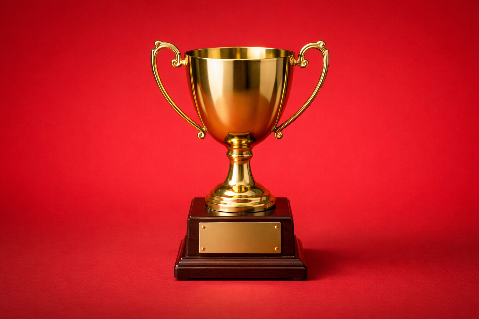 gold trophy against red background