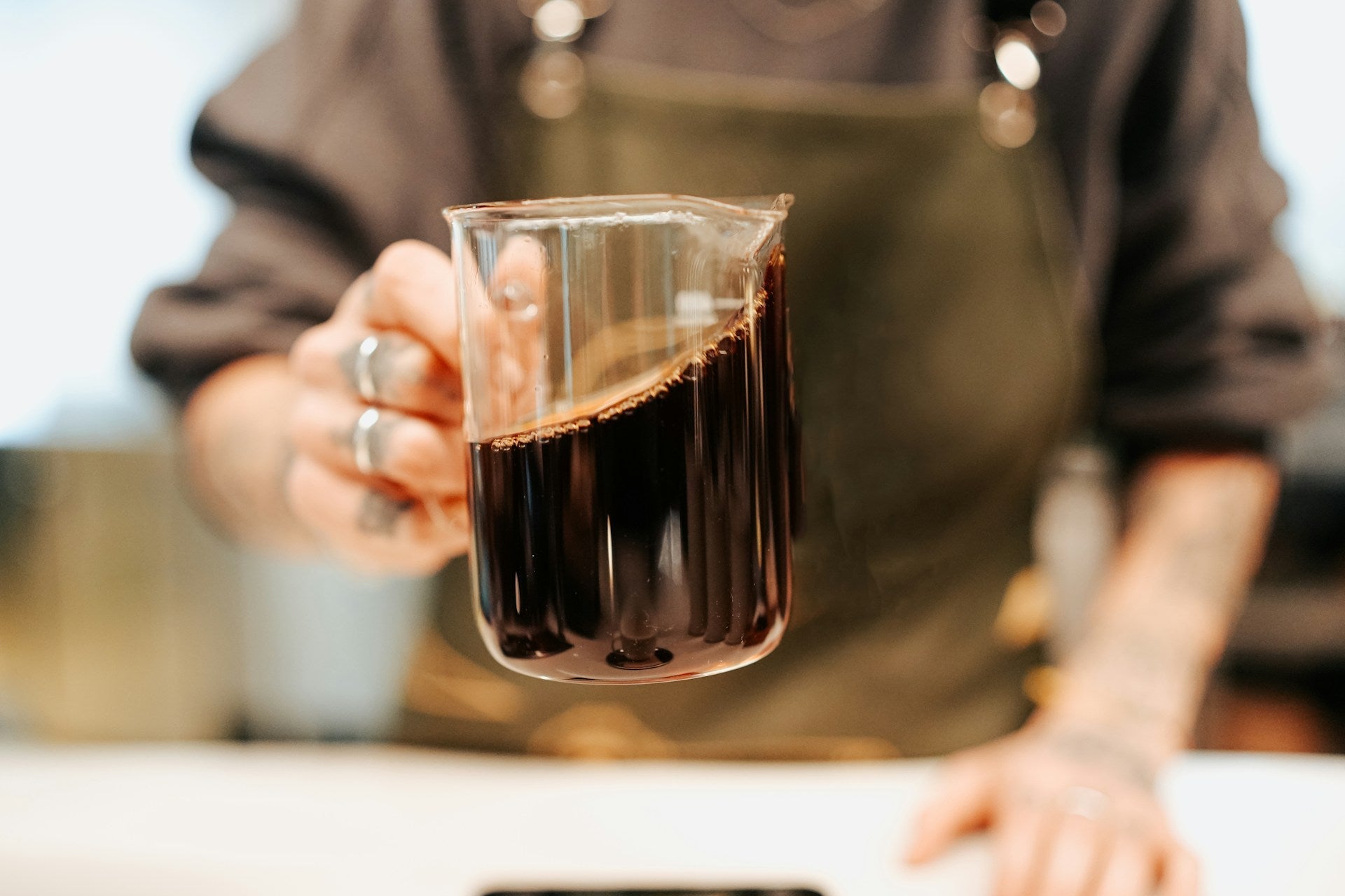 coffee in a carafe being swirled around
