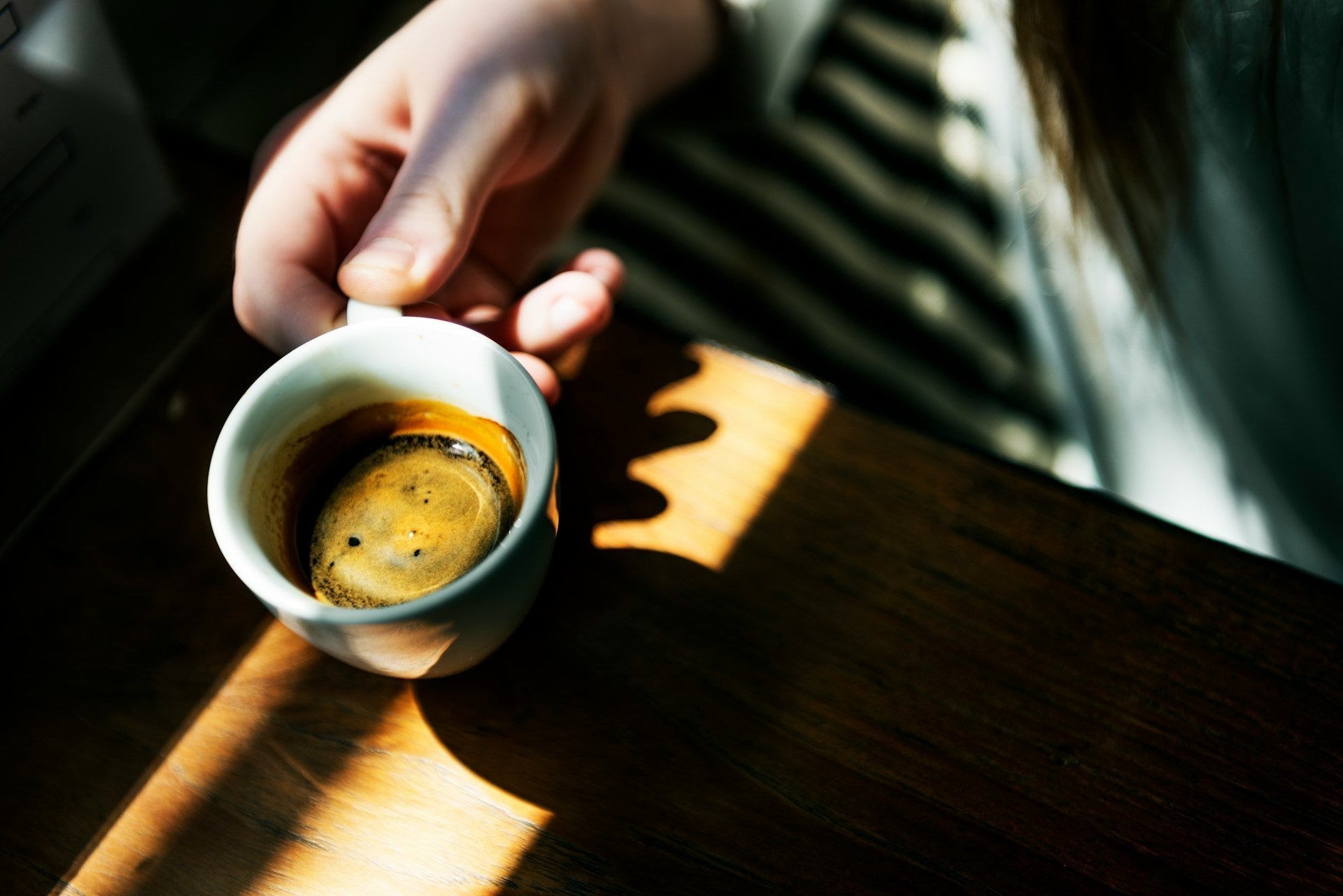 espresso cup with shot of espresso inside it
