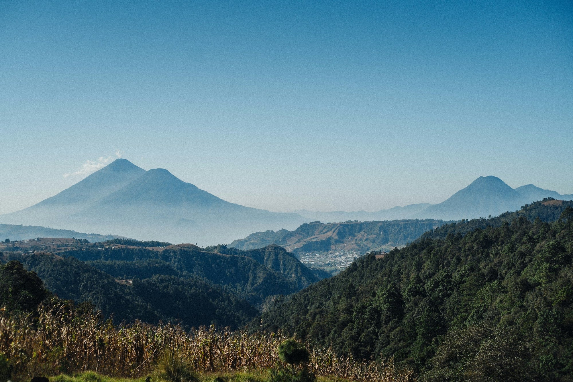 Guatemala landscape featuring volcano in the distance
