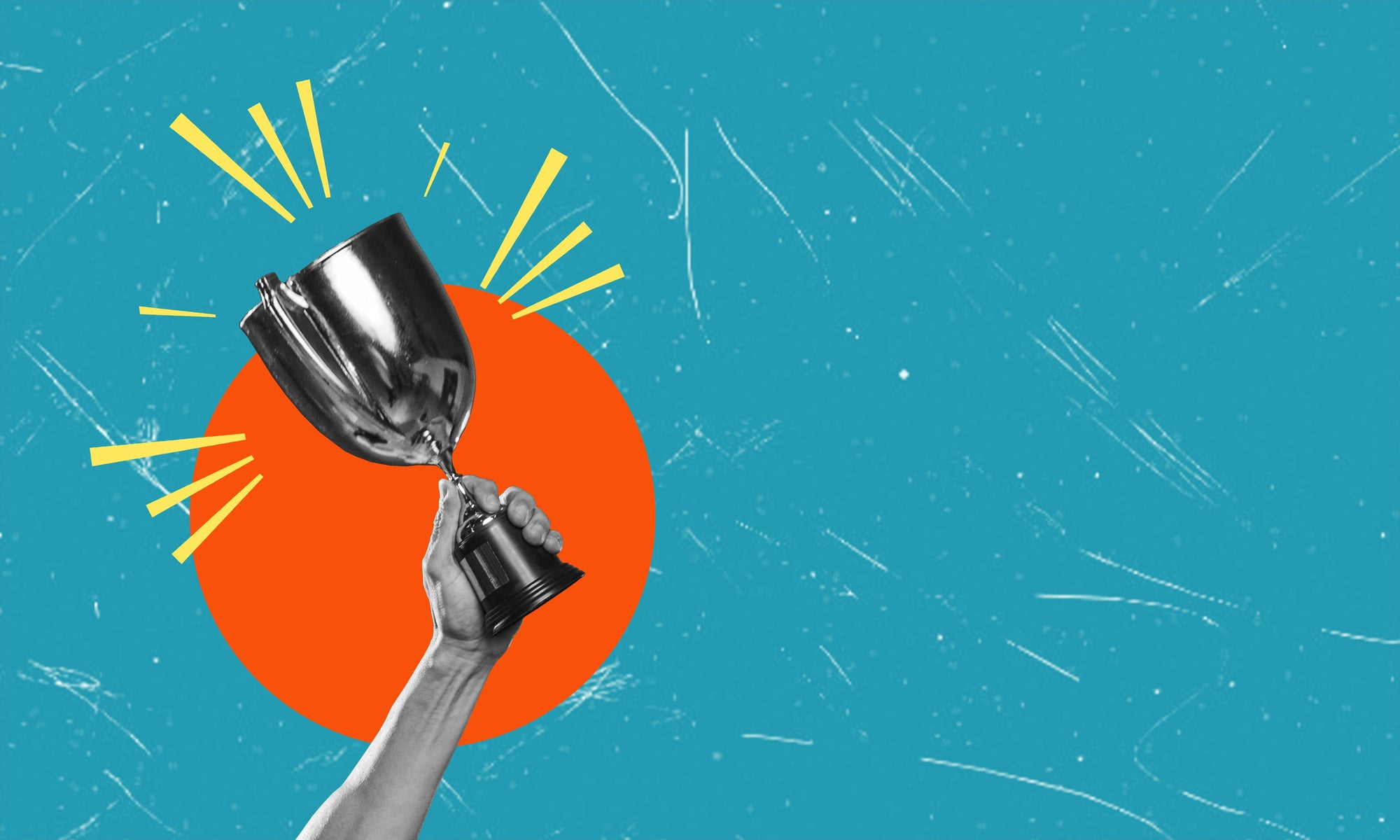 hand holding trophy against light blue background