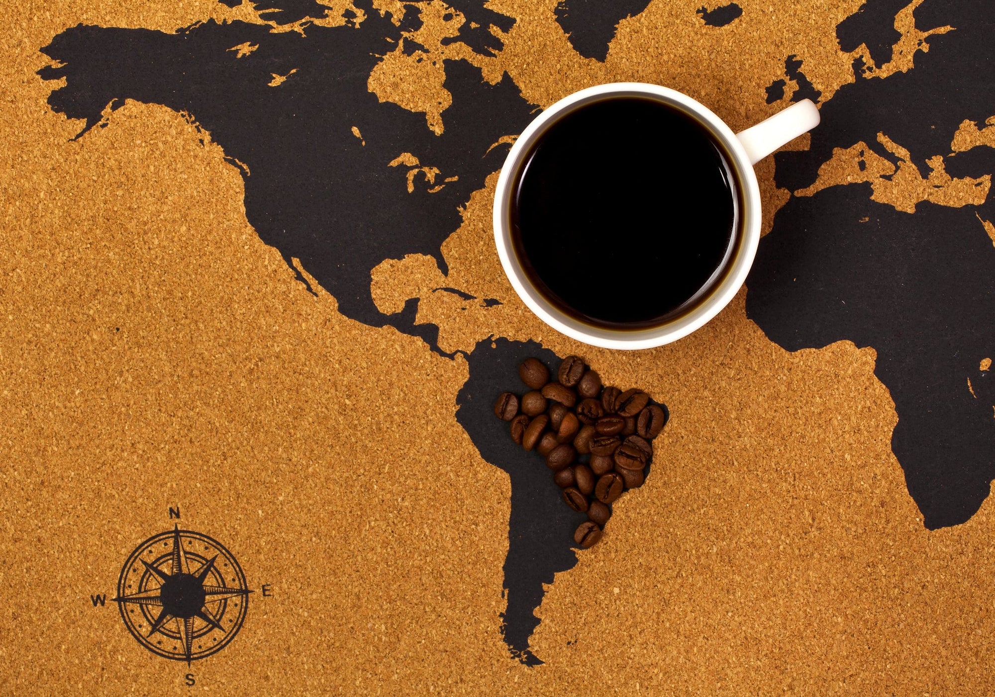 Map showing coffee beans resting on Brazil