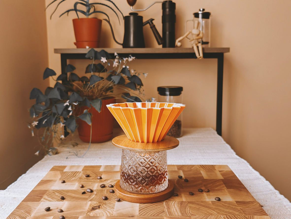 Pour over coffee being made in orange Origami dripper
