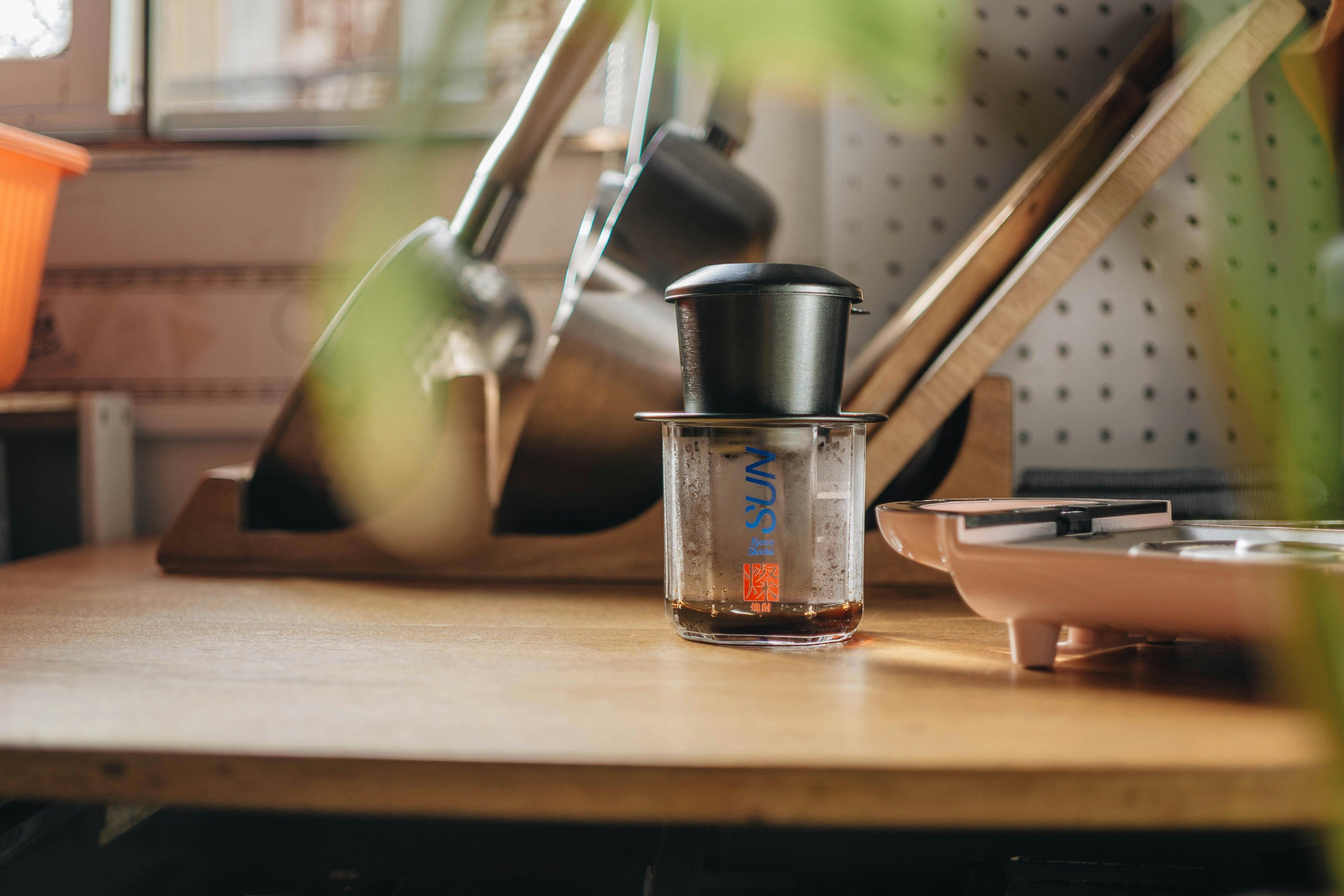 vietnamese phin coffee brewer on countertop