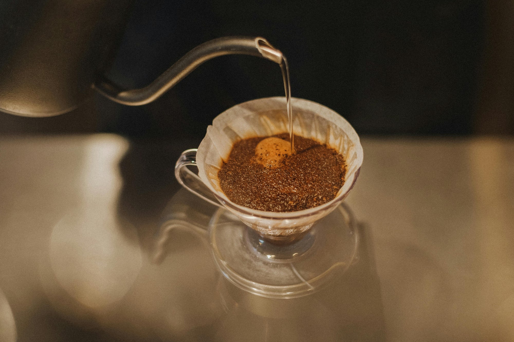 pour over coffee blooming in coffee dripper