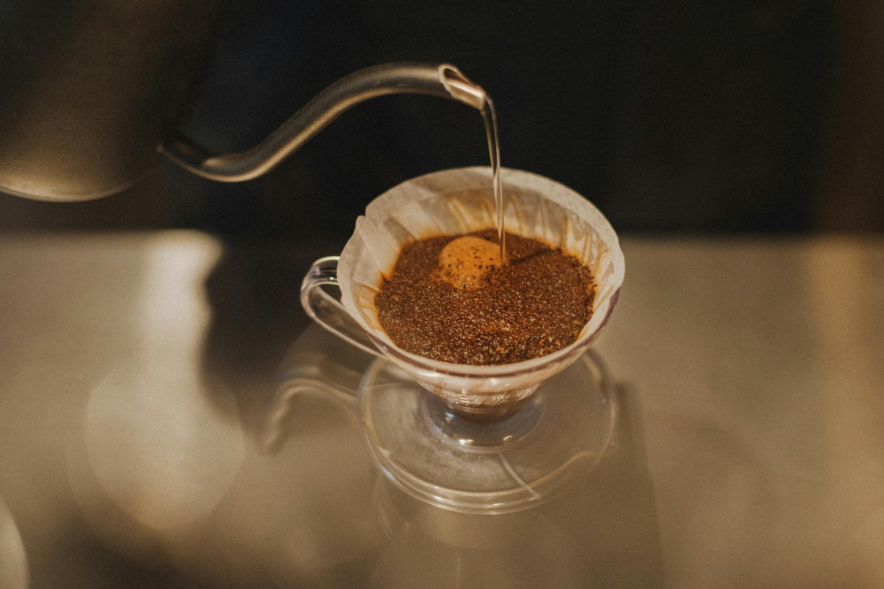 pour over coffee blooming in coffee dripper