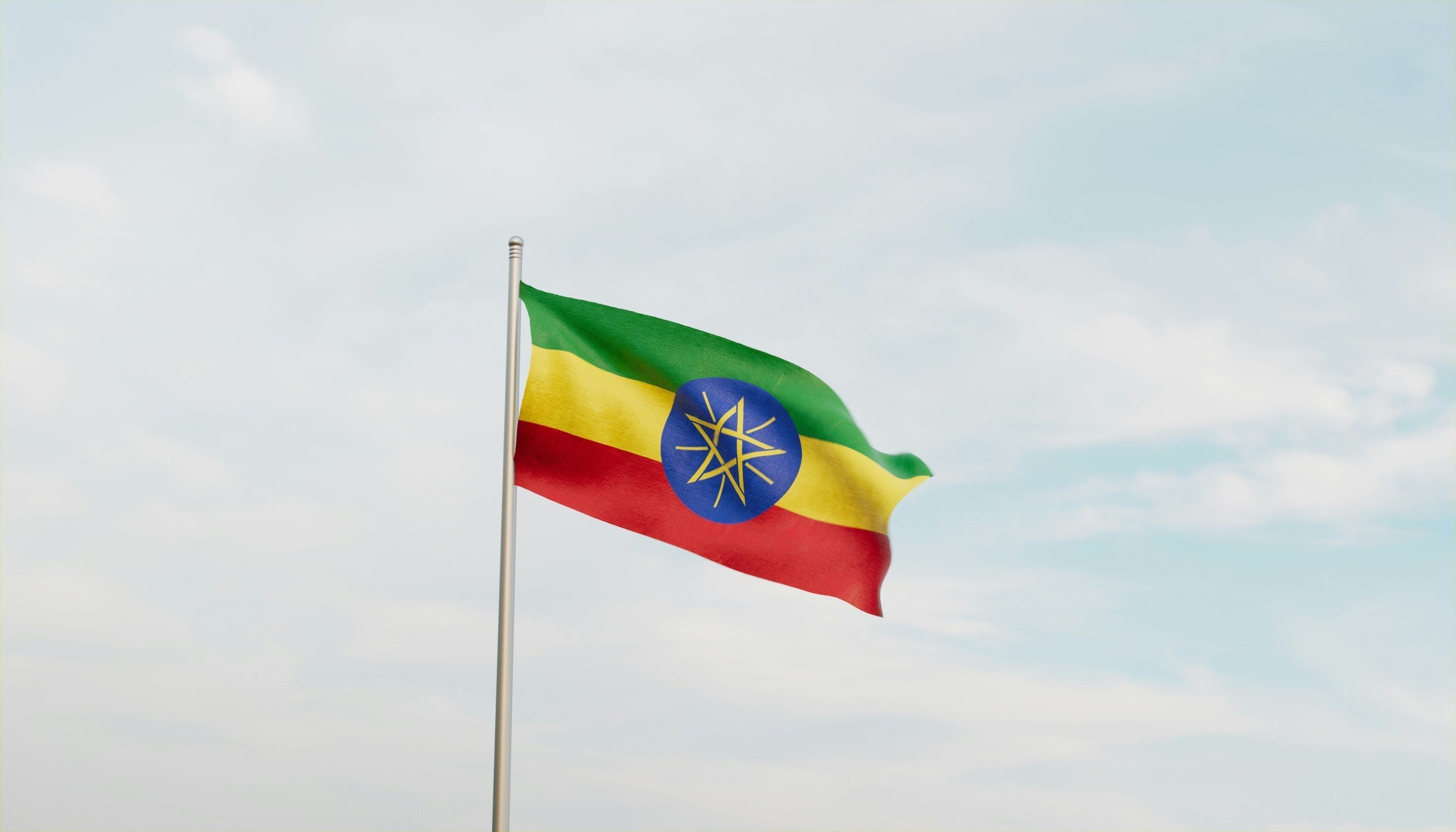 Ethiopia flag against a blue sky