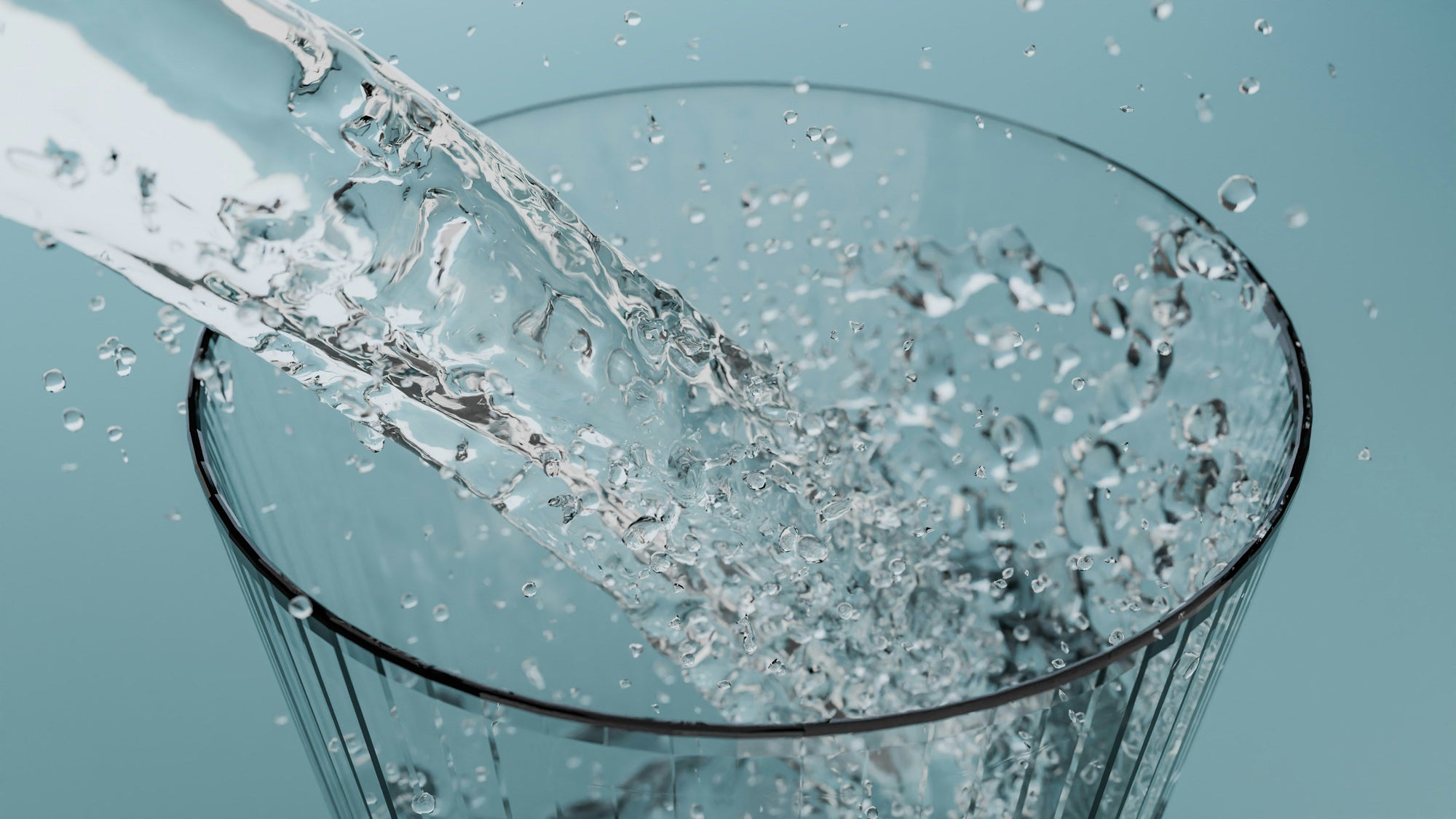water pouring fast into glass