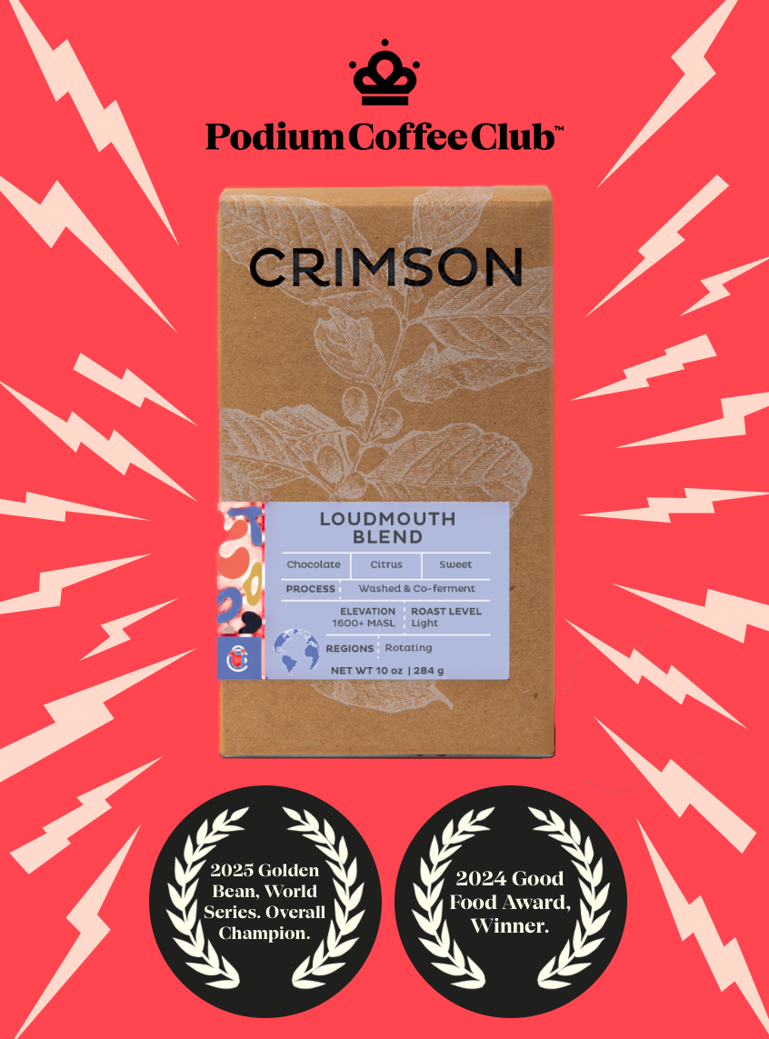 Podium Coffee Club Crimson Loudmouth Blend package on a red background with awards displayed.